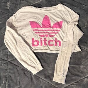 White Long Sleeve Crop Top with Pink Graphic